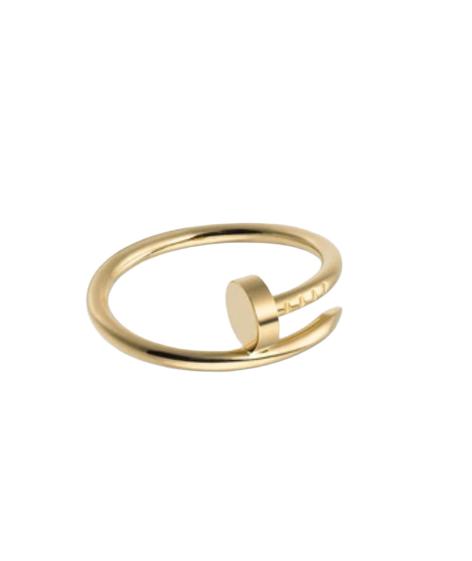 Gold ring with a unique design on a white background